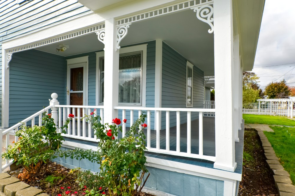 A covered wraparound porch